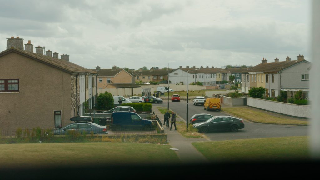 Residential cul-de-sac surrounded by row houses in a North Dublin housing estate