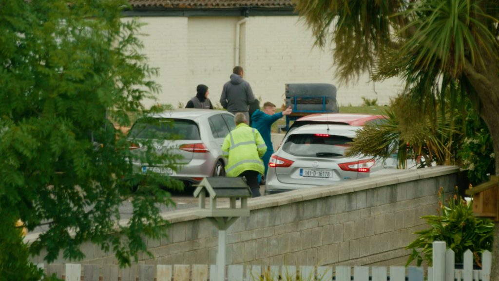 Individuals engaged in suspected drug dealing at the end of a cul-de-sac in a North Dublin residential area near Darndale
