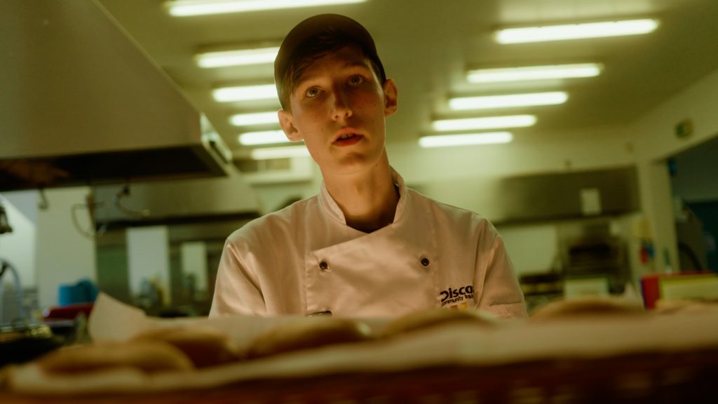 Portrait of young man at Discovery Community Training Centre, part of a second-chance education program in Darndale