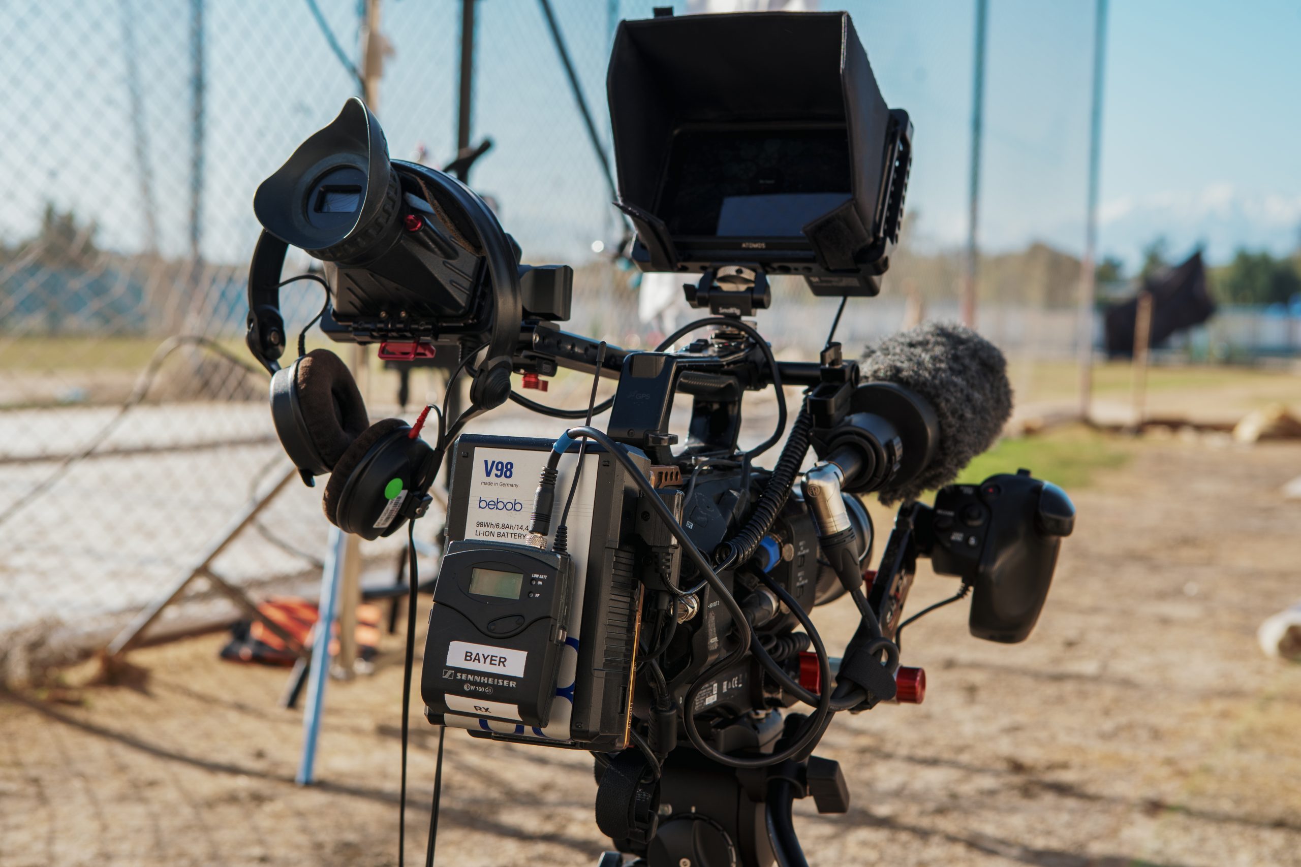 FS7 camera rig configured for a documentary master interview in Afghanistan, featuring an Atomos Ninja V monitor, Sennheiser G3 wireless system, V-Mount battery, Sennheiser MKH 416 shotgun mic, and Fujinon 18–55mm T2.9 cine zoom lens.