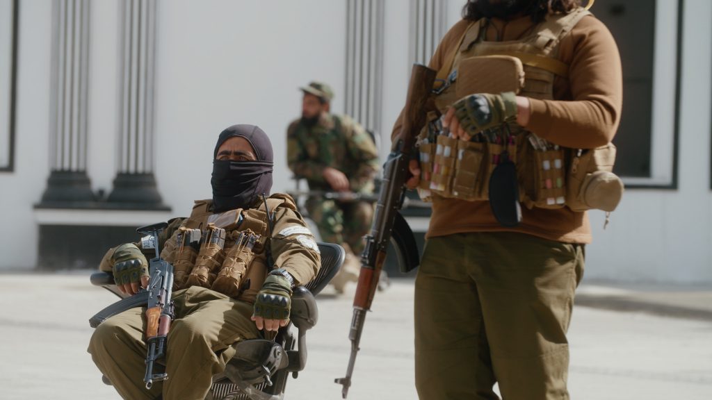 GDI Taliban security forces with AKMs and body armor at a checkpoint in Kabul