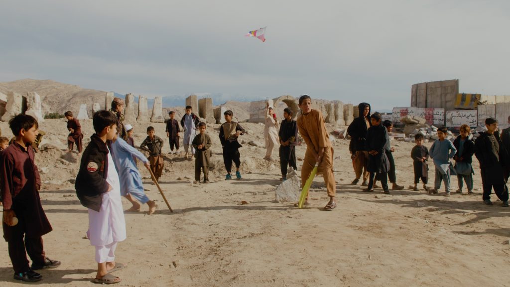 Children playing street cricket in Jalalabad, Afghanistan